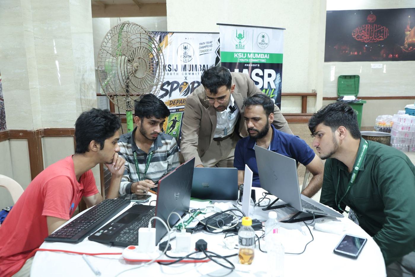 A team working together on laptops